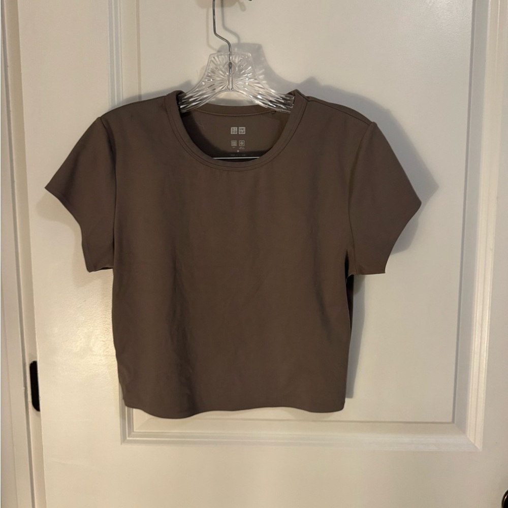 Brown greyish crop top. Athletic material